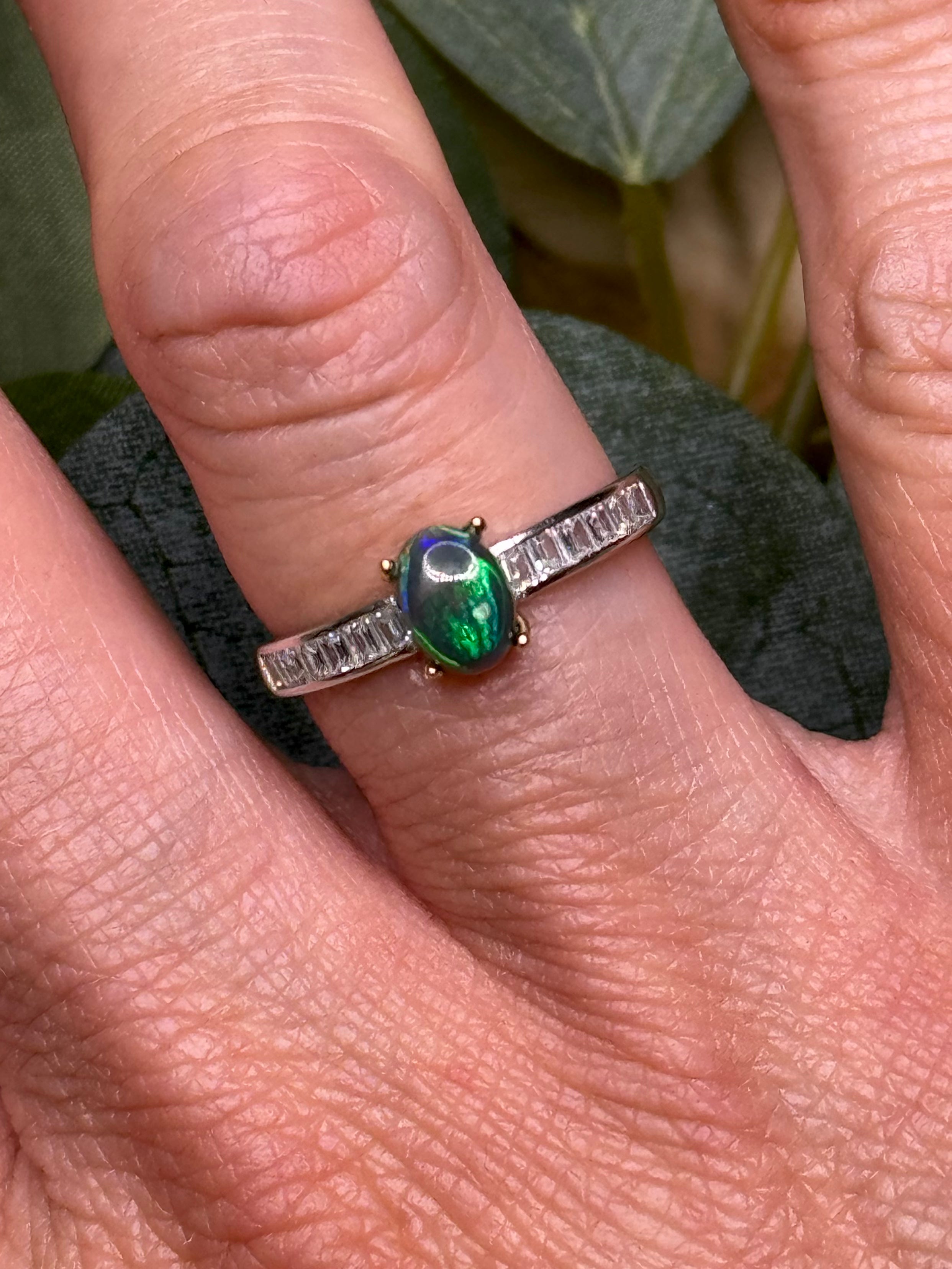 Oval natural black opal adjustable ring in sterling silver