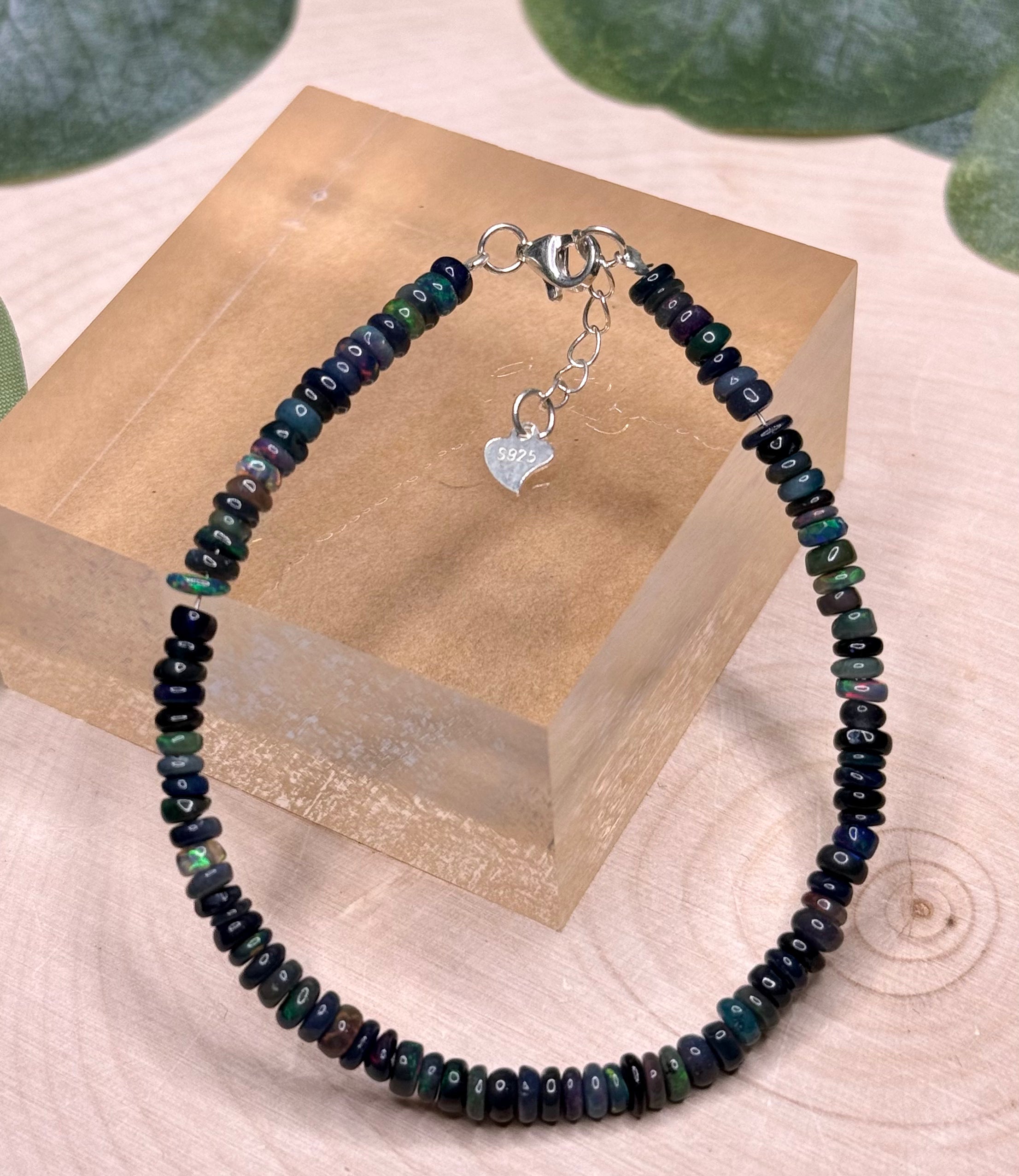 Black opal bead bracelet with a sterling silver clasp
