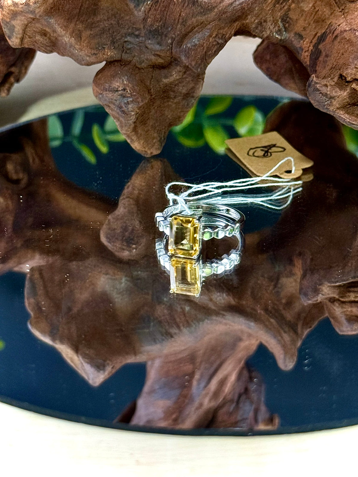 Citrine gemstone ring with an adjustable silver band