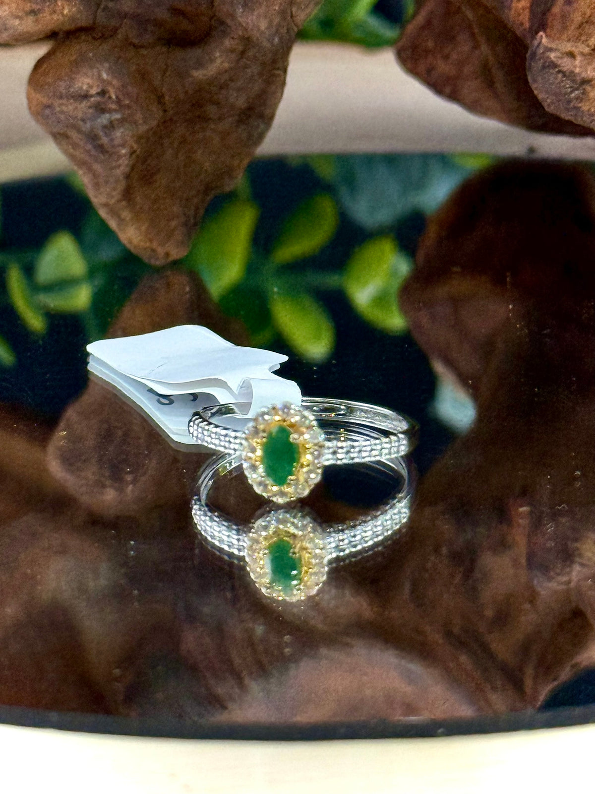 Emerald adjustable ring with a gold-tone accent