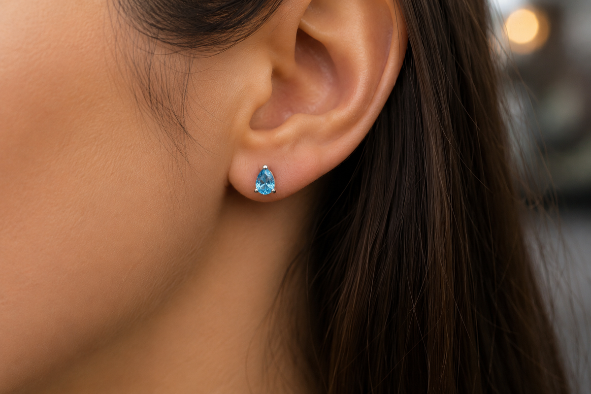 Second view of Swiss Blue Topaz stud earrings