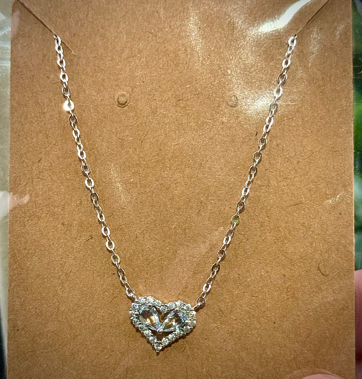 Pale blue aquamarine heart pendant necklace in sterling silver