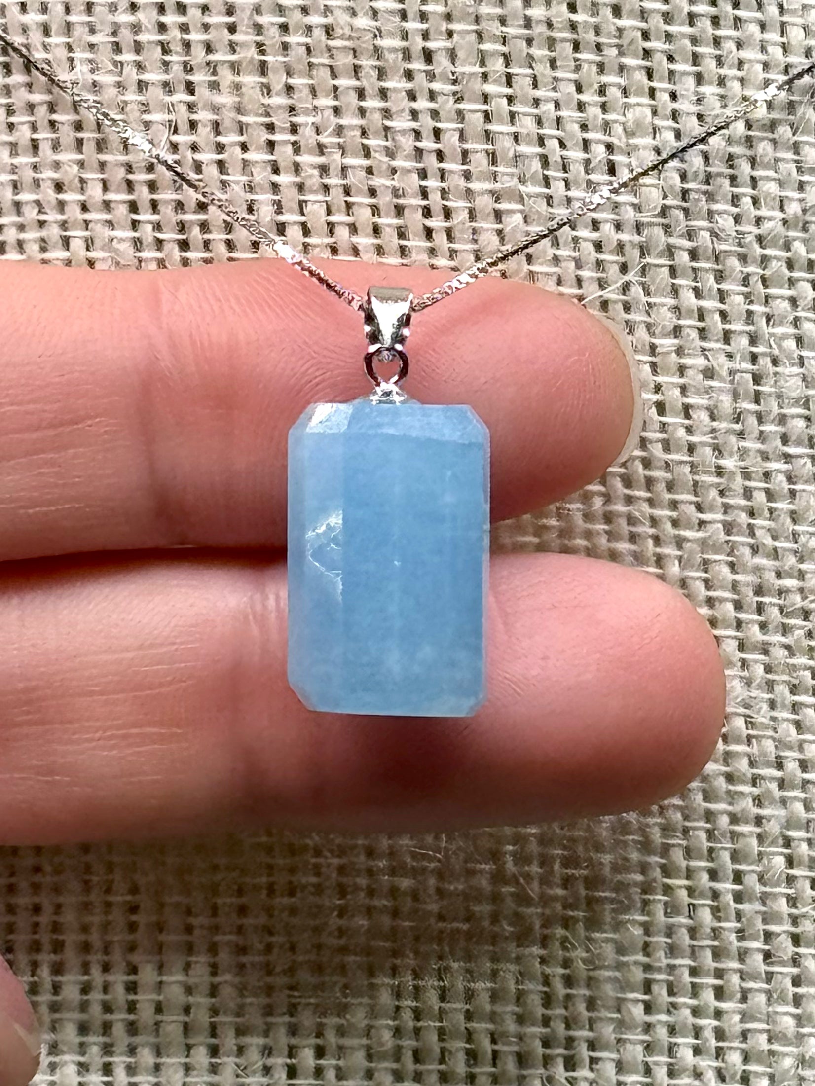 Faceted pale blue aquamarine cylinder pendant
