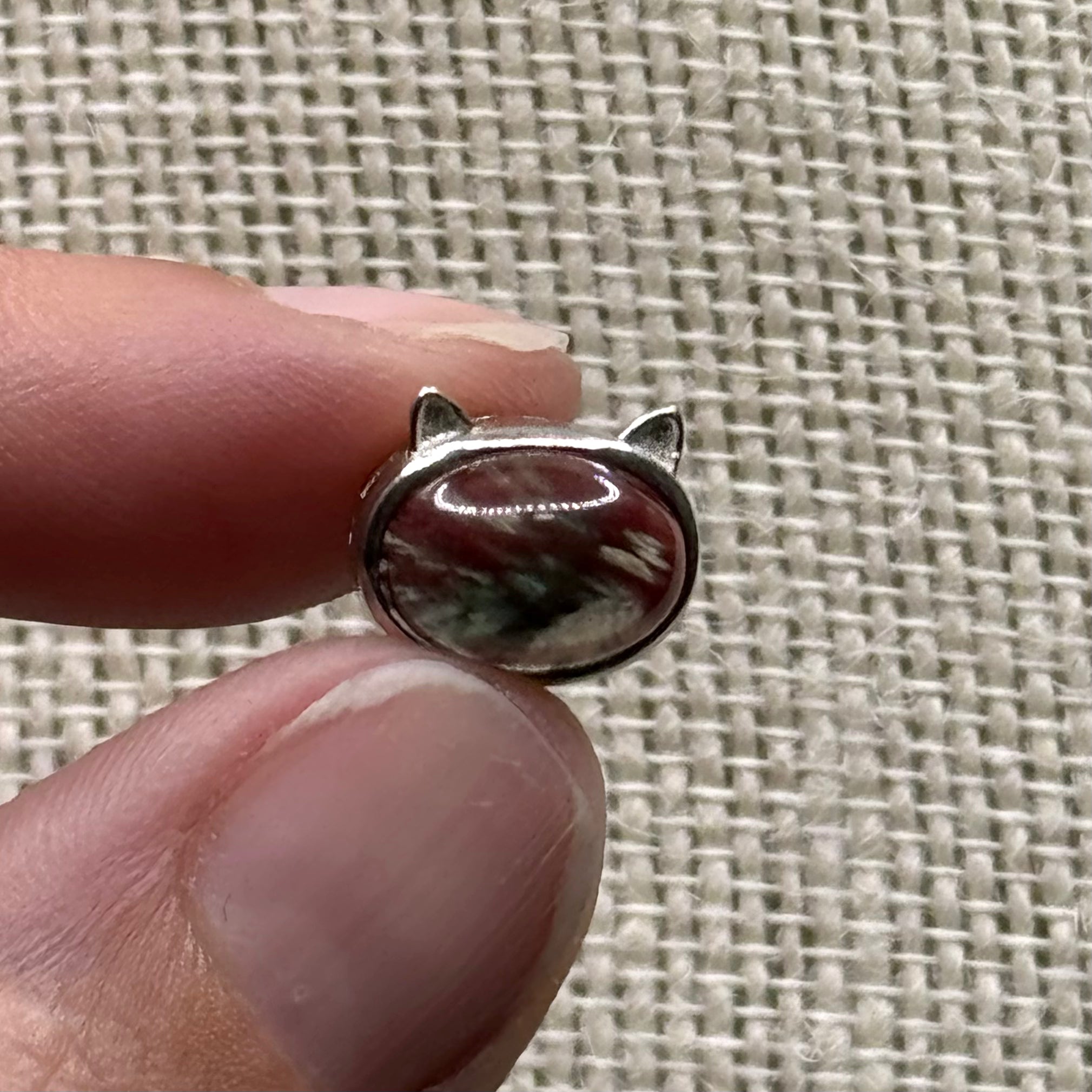 Natural andalusite cat pendant with striped polished gemstone