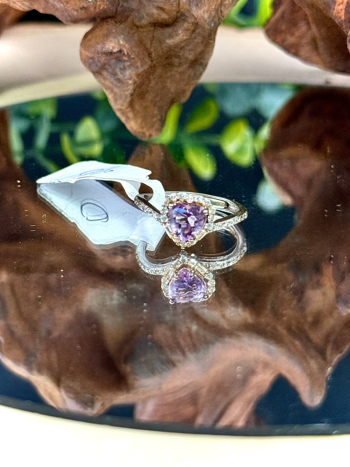 Amethyst gemstone ring with an adjustable silver band