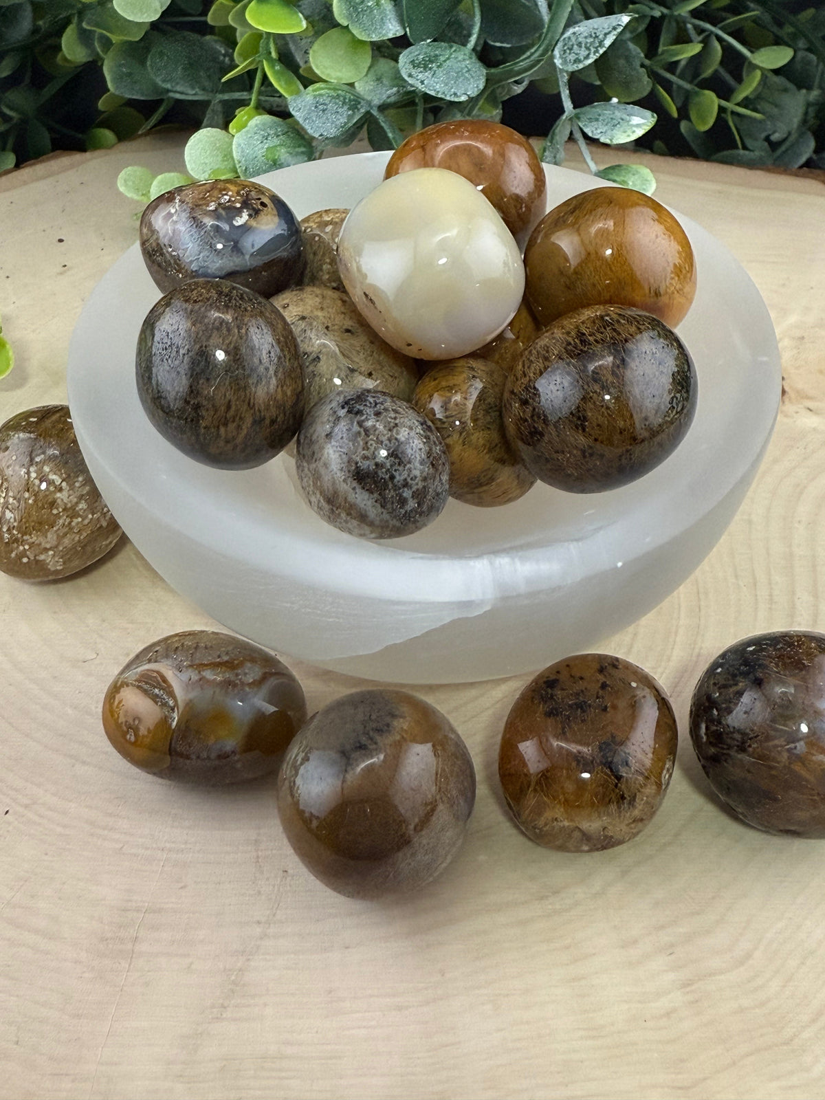 Assorted polished mystery tumble stones in varied colors and patterns
