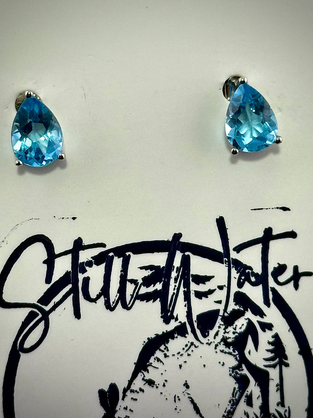 Third view of Swiss Blue Topaz stud earrings