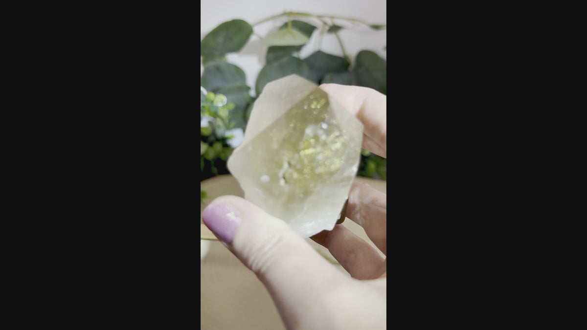 Brazilian Gold Rutilated Quartz on Display Stand
