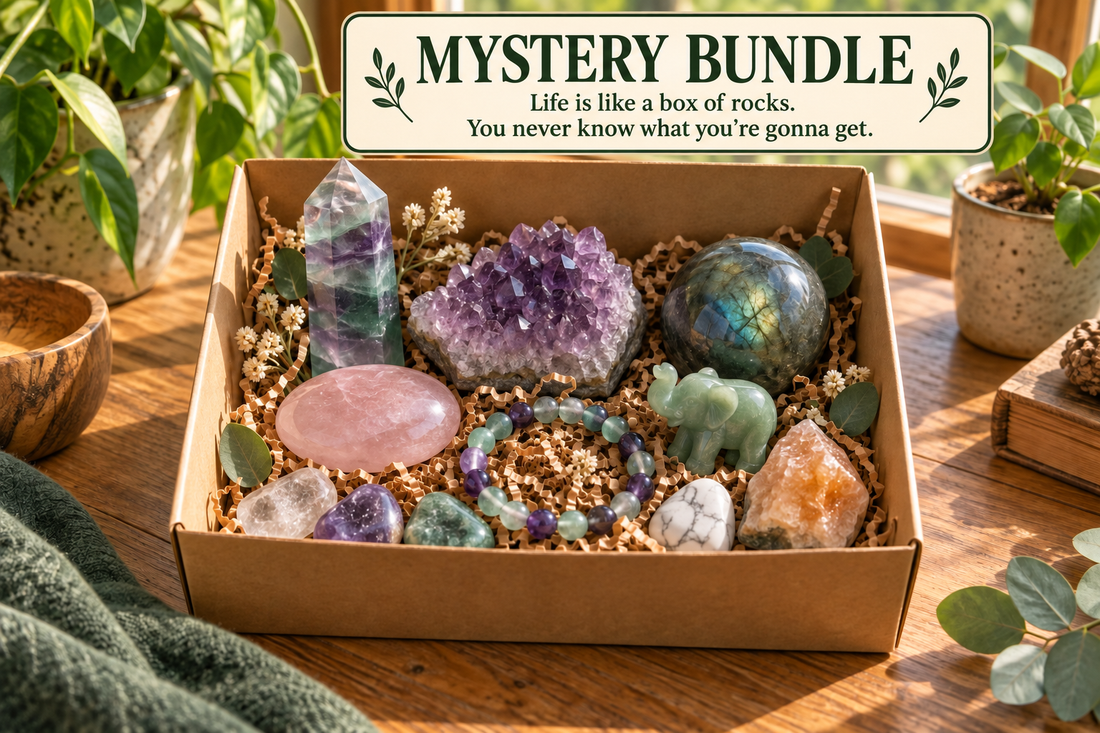 Mystery Crystal Bundle with assorted natural crystals in a kraft box beside a sunlit woodland window